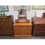 A circa 1900 satin walnut dressing chest, two short over two long drawers and jewellery drawer.