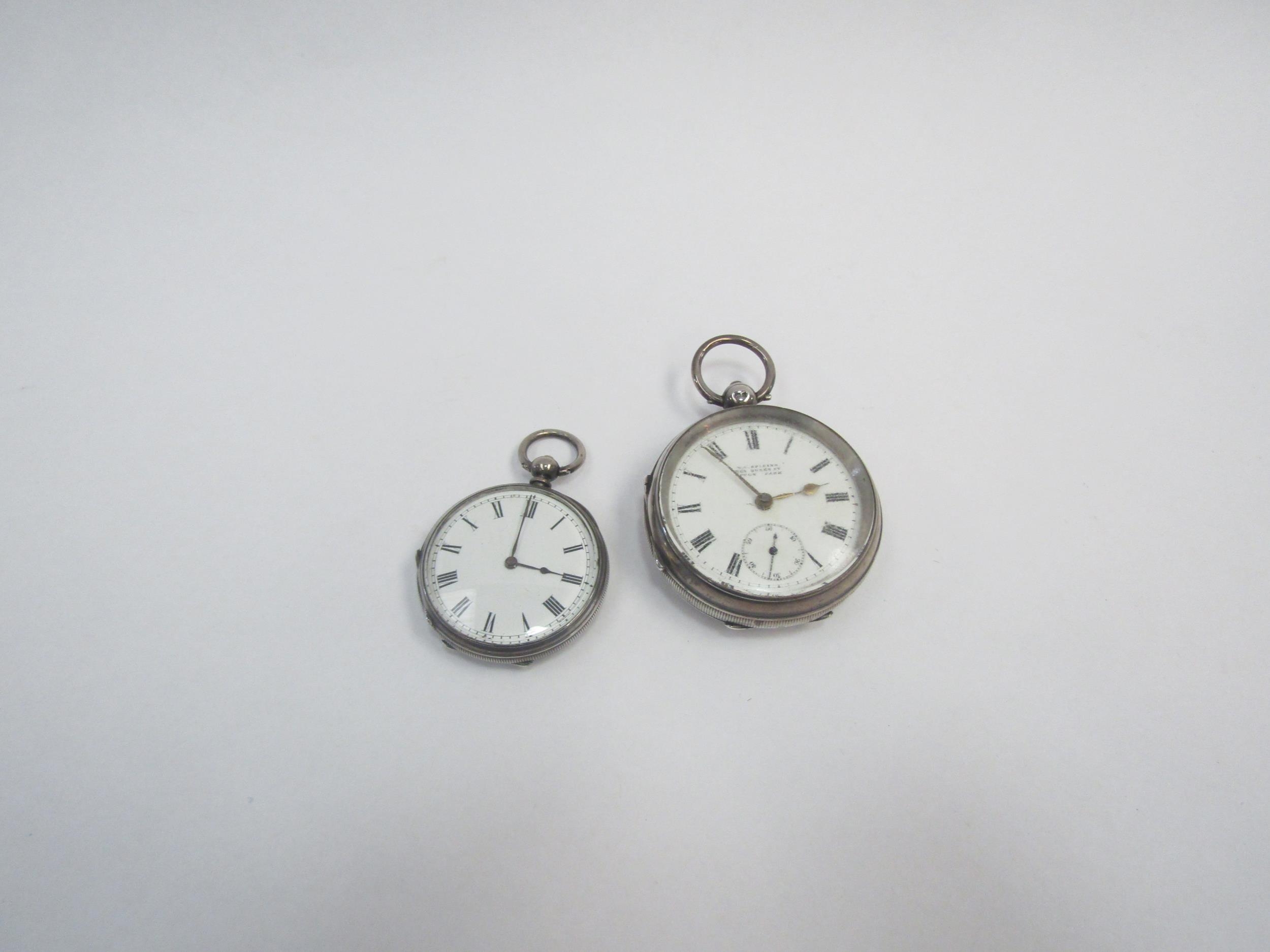 Two pocket watches; one silver example by W.C. Spikins, Upton Park, the other marked 'fine