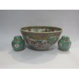 A Cantonese famille rose bowl, foliate and garden scenes with figures, character marks to base, 30cm