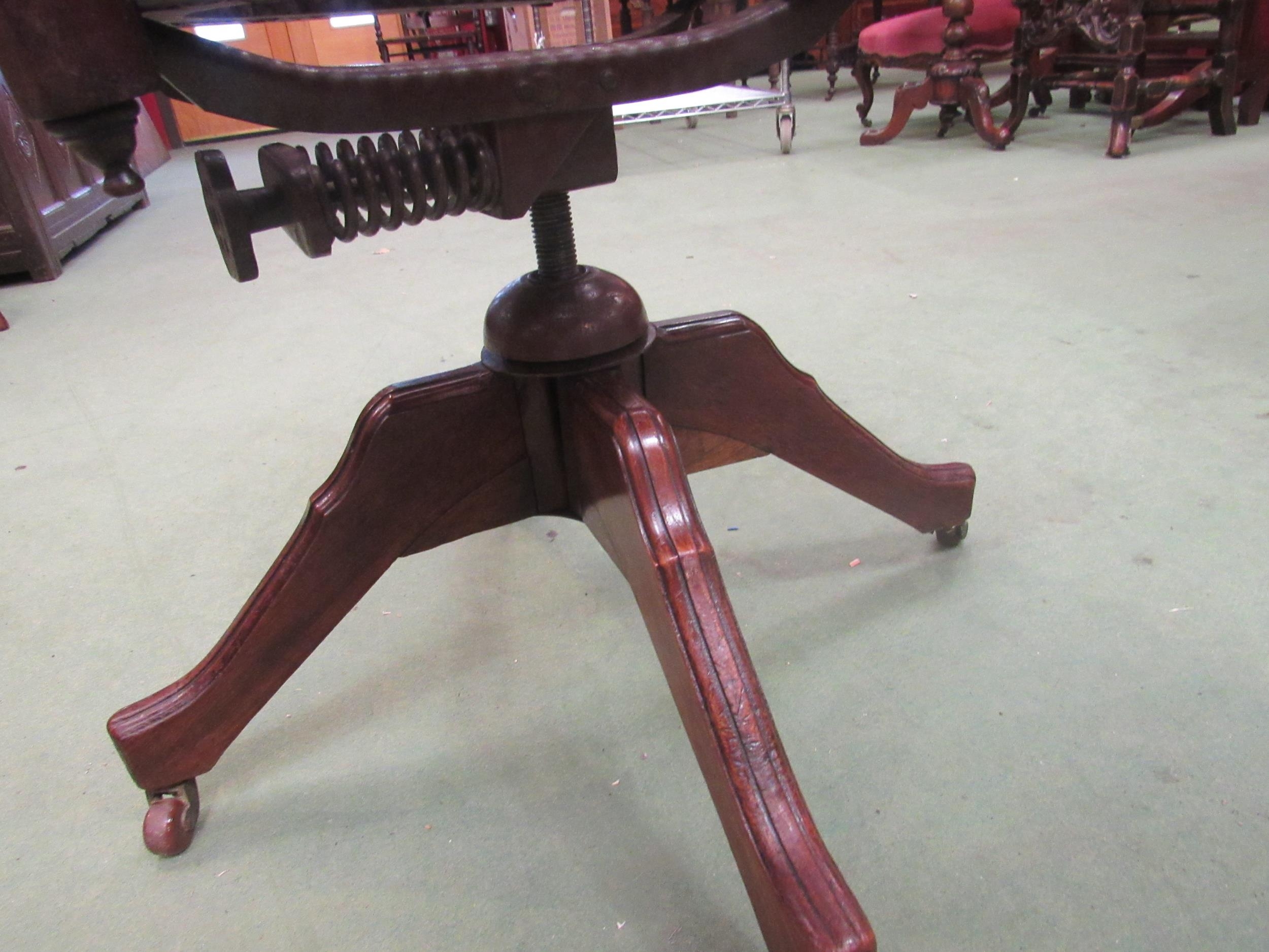 A circa 1900 oak and mahogany cane seat and backrest revolving office chair with walnut decoration - Image 2 of 2