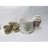 A Portmeirion botanic garden vase, jardiniere and torquay ware mugs