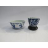 A blue and white bowl decorated with three figures 11.5cm diameter, together with a small dish