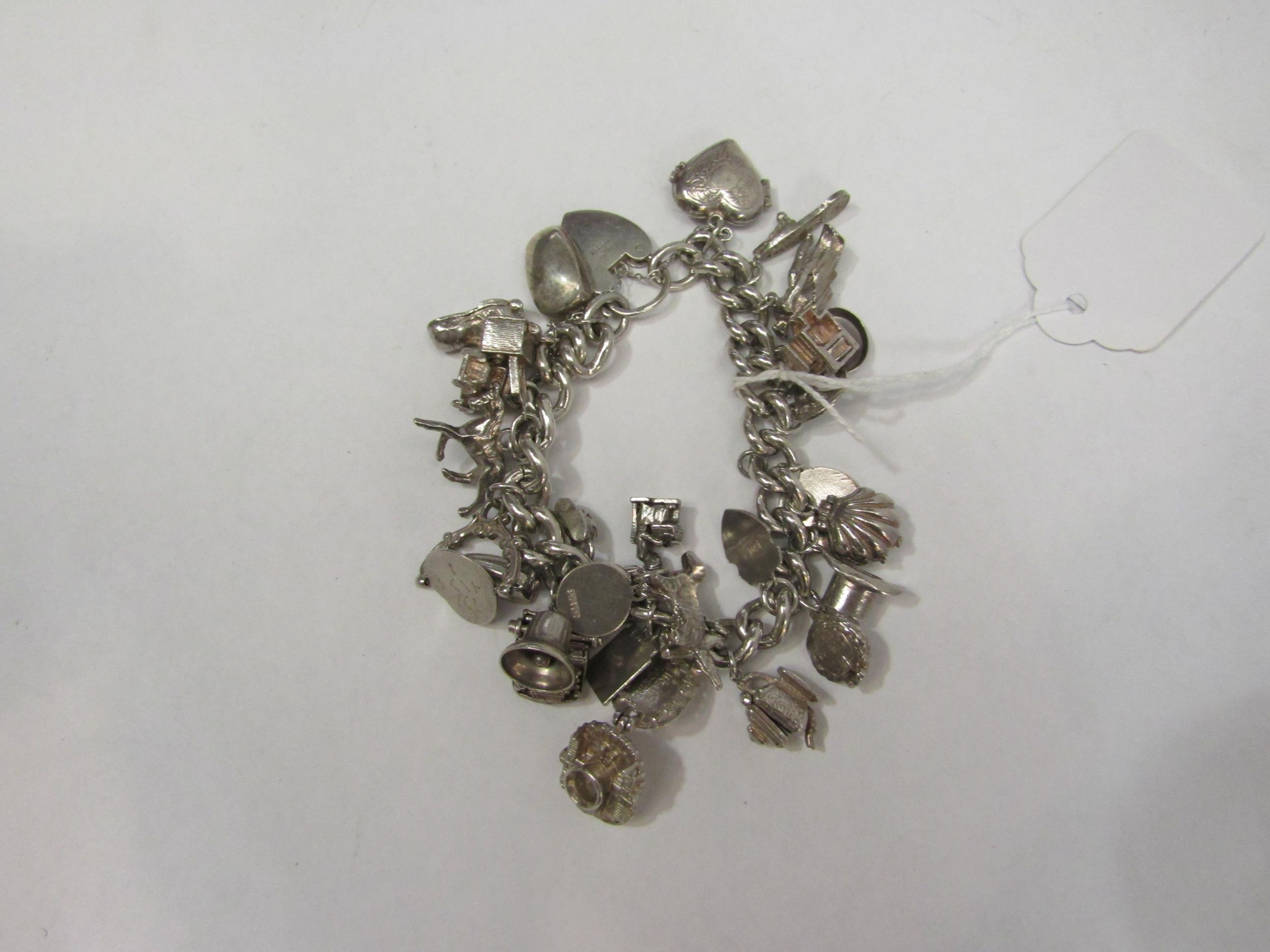 A silver curb link charm bracelet - Image 2 of 2