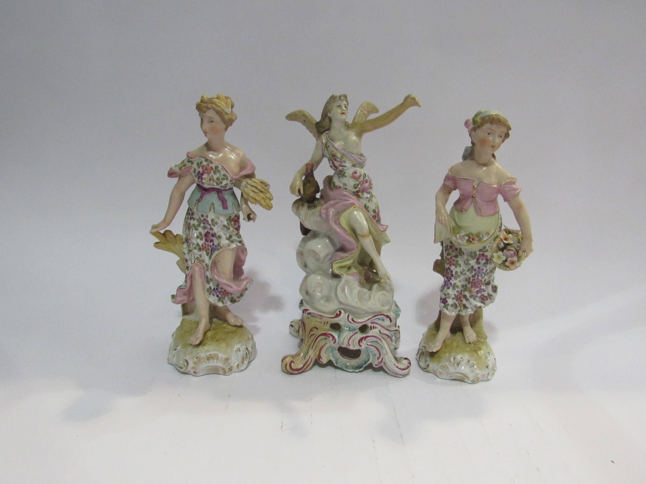 Three 18th Century style figures including maiden bearing wheat, two a/f, 21 cm high approximately