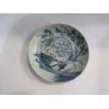 A blue and white Oriental plate, 21.5cm in diameter