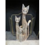 A set of three tall carved cats, 1970's style, 78cm high
