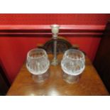 A pair of Waterford crystal Colleen pattern brandy glasses together with a glass candle holder