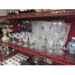 A selection of cut crystal glassware including two Stuart champagne flutes, Waterford Crystal vase