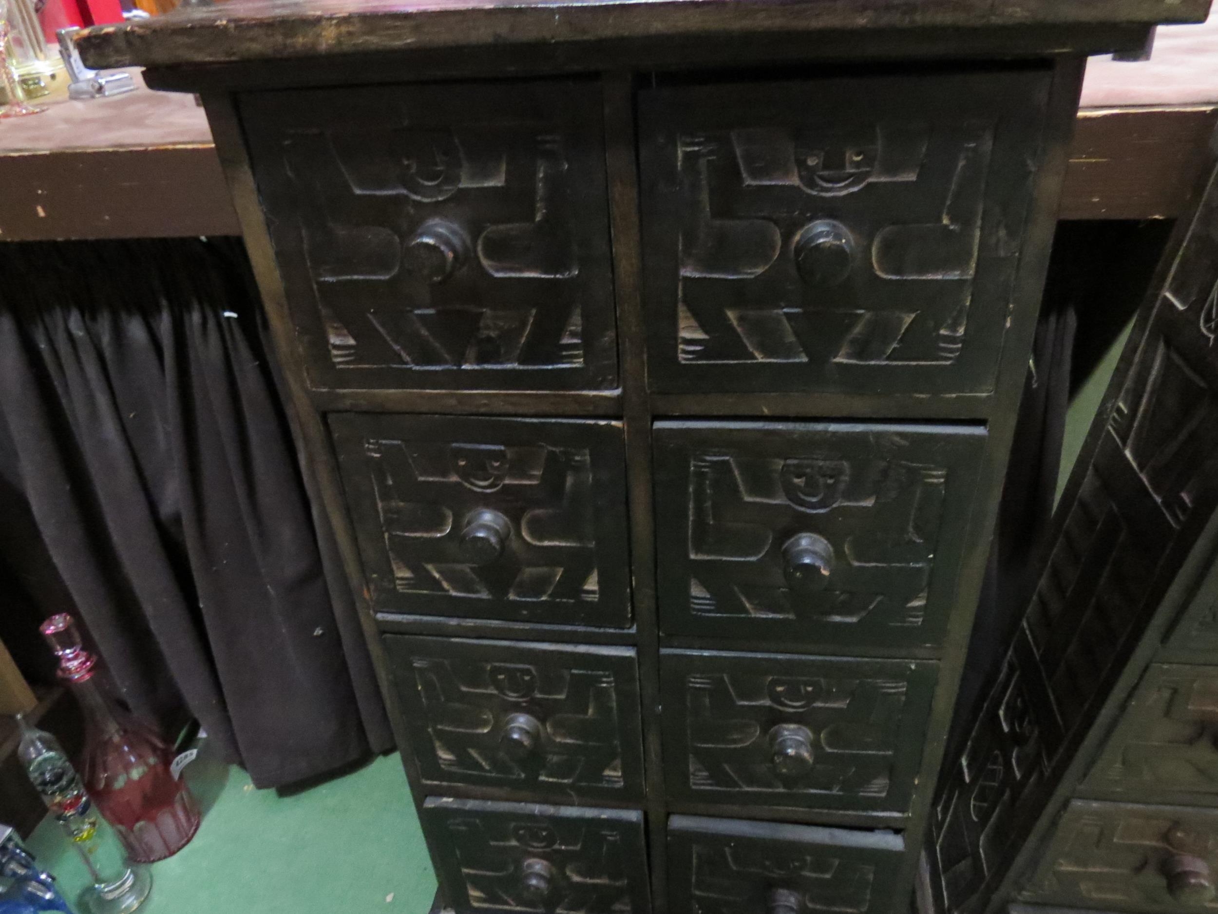 A small carved African wooden chest of eight drawers, 84cm high x 46cm wide, together with another - Image 3 of 6
