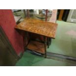 An Edwardian/1930's oak side table with undertier, 60cm high x 50cm long x 30cm wide