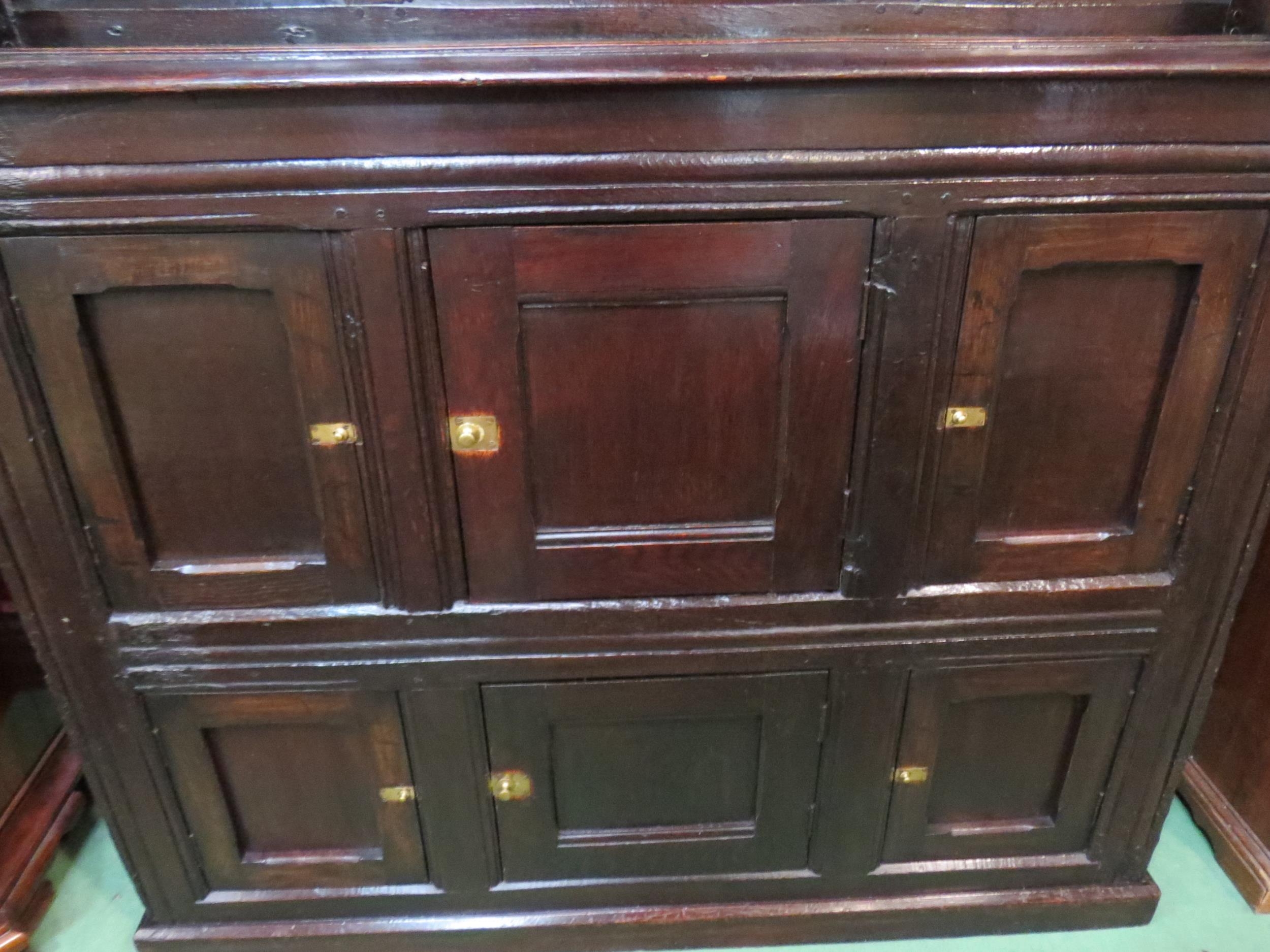 A Circa 1700 English pegged oak court cupboard with unusual bank of nine cupboard panelled doors - Image 3 of 8