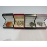 Four brooches including silver example as a basket of flowers, agate, etc