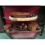 A collection of trays to include African and Asian examples and decorative gourds