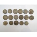 A collection of 19th Century and earlier Mughal/Bengal coins in silver and copper