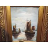 A gilt framed oil on board, 19th Century sailboats at sea signed by A Ruberni lower right, frame