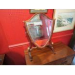 A Sheraton style reproduction shield dressing table mirror