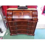 An early 19th Century style crossbanded walnut bureau with working lock and key the fitted