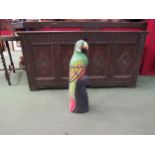 A 1970's style carved/painted parrot, 57cm tall
