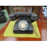 A vintage telephone in black