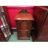 A late Victorian carved raised back walnut and burr walnut bedside cabinet the single door over a