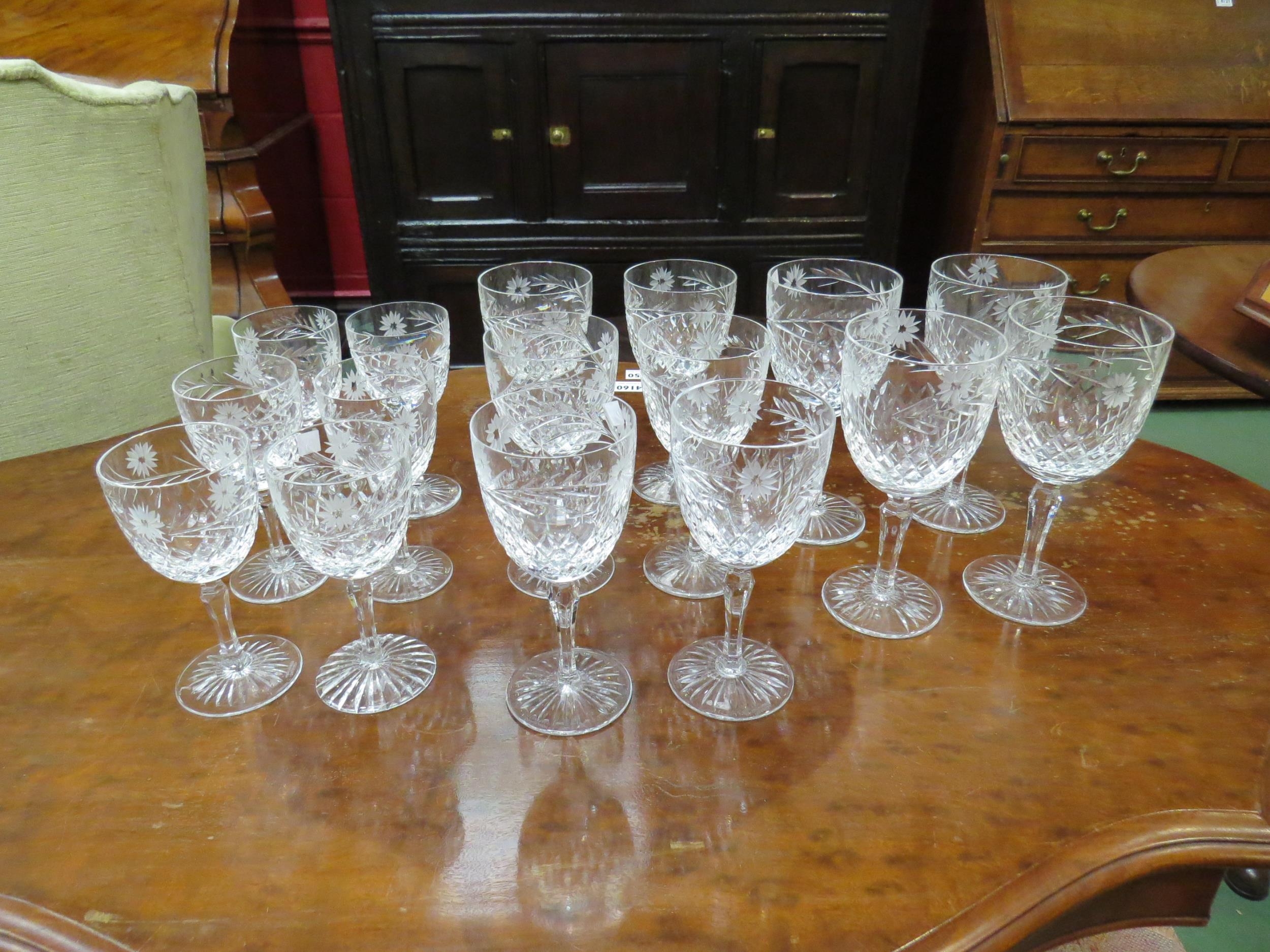 Four Edinburgh crystal Argyle pattern large wine glasses, together with six small wine and six