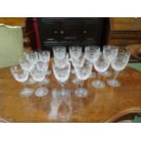 Four Edinburgh crystal Argyle pattern large wine glasses, together with six small wine and six