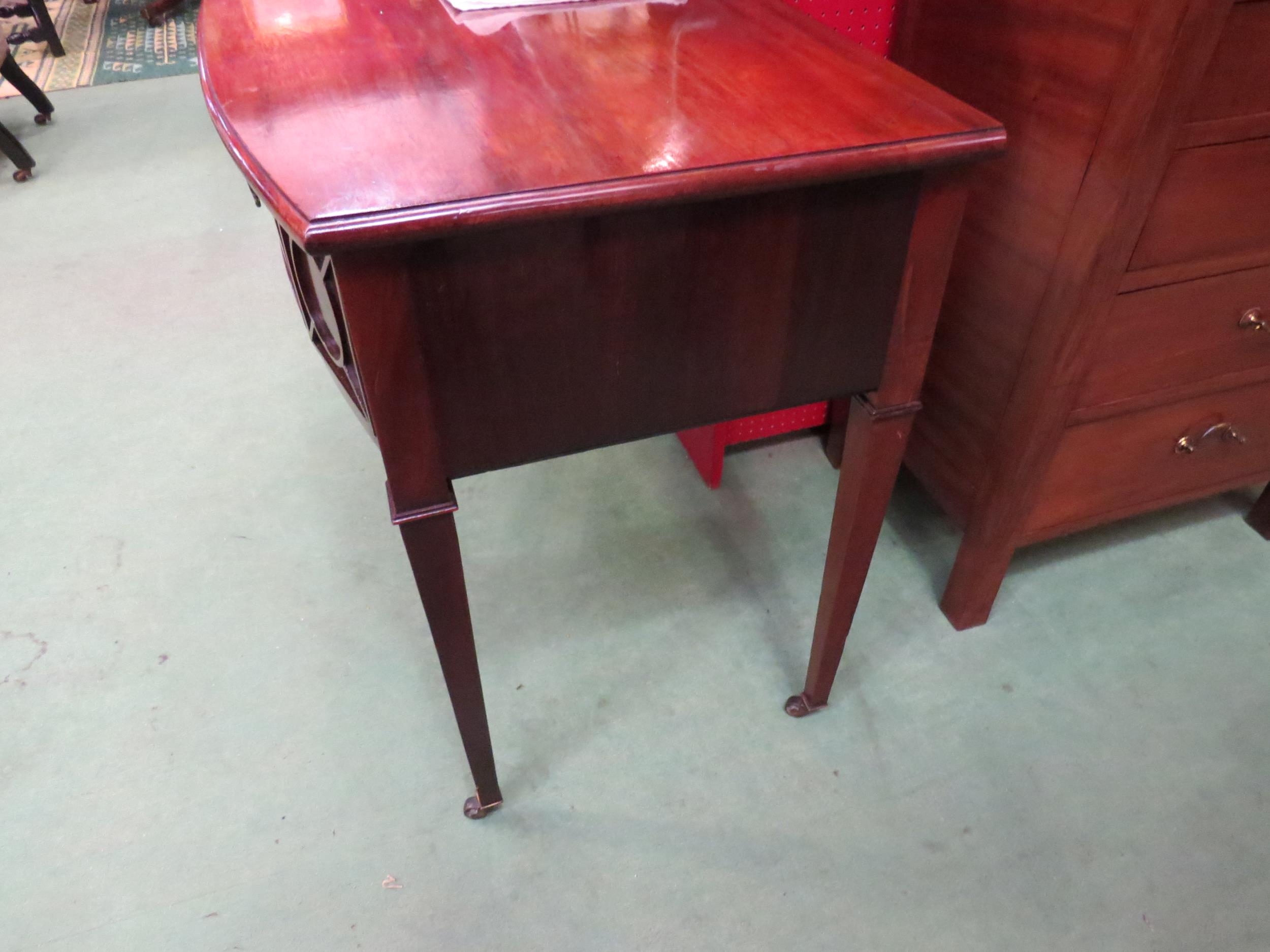 Circa 1860 a flame mahogany bow front side table, the single frieze drawer flanked by moulded panels - Image 2 of 4