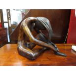 An Art sculpture figure of a nude female with head down, 17cm tall
