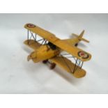A tinplate model of a WWI aircraft