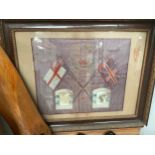 A 'Souvenir of Egypt' embroidered silk panel with crossed flags and crown design, with inset