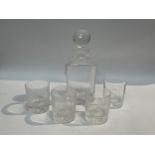 An Elizabeth II Royal Military Police glass decanter together with four whisky tumblers also