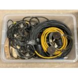 A box of wireless wiring including headset, phones etc.