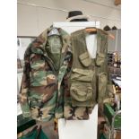 A post-war US survival vest together with medium short camouflage smock (2)