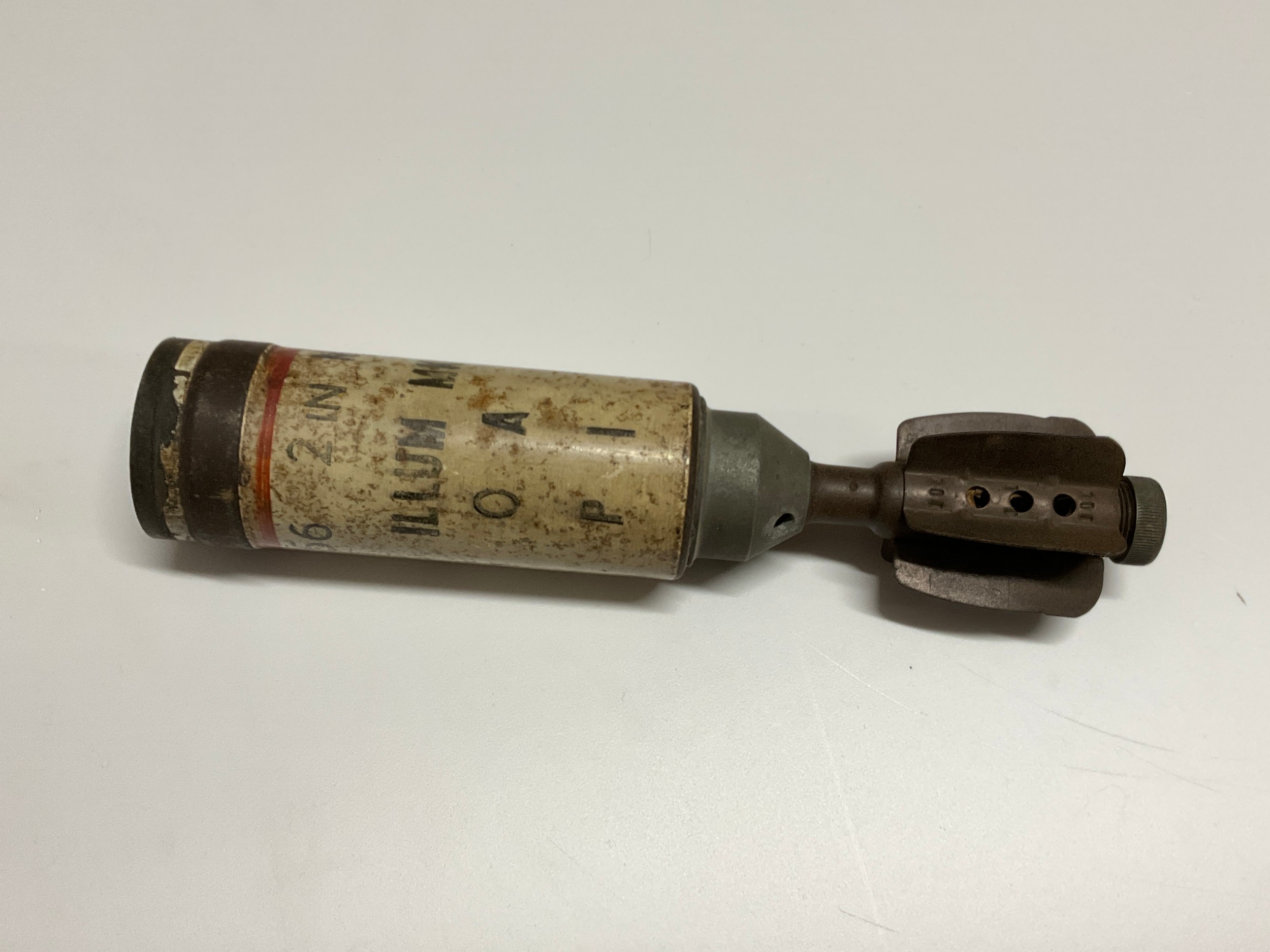 An inert 2" mortar round, dated 11/56