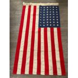 A reproduction US flag bearing 1943 date