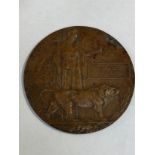 A WWI memorial plaque / death penny named to WILLIAM MILES METCALFE. Royal Berkshire Regiment,