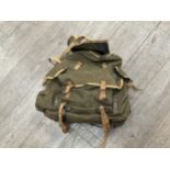 A WWII 1945 dated canvas backpack by Finnigans Ltd