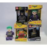 Four boxed Lego Batman alarm clocks and an unboxed Joker example (5)