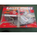 A box of loose Micro Scalextric to include set G1005 Rallye Stages cars and G082 Jaguar XJ220 car,