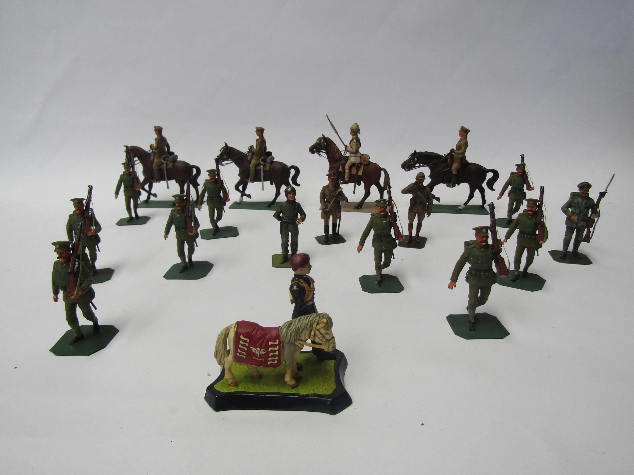 A collection of lead figures of WW1 era British Army servicemen including mounted officers and