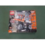 A Lego Technic set 8110 Mercedes Benz Unimog, contents loose in box but appear complete