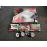 A boxed SNES Super Nintendo Entertainment System and games; PGA Tour Golf, PGA European Tour and Top