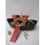 A Playmobil Noah's Ark together with Noah and a quantity of wooden animals