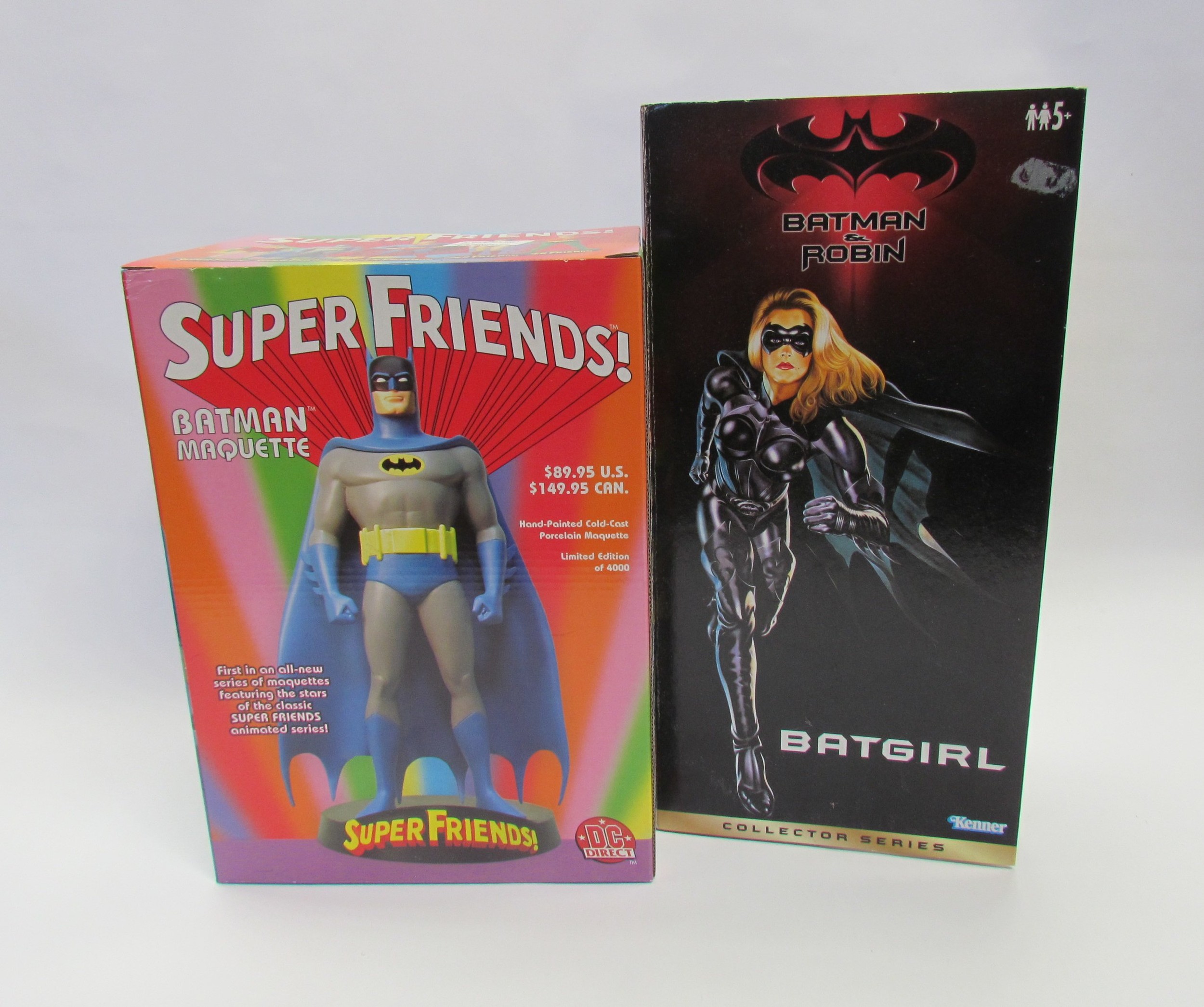 A boxed DC Direct limited edition Super Friends Batman Maquette and boxed Kenner Batman & Robin