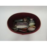 A box of miscellaneous items including 925 paperweight (a/f), shell eticules, pipe, candle snuffer