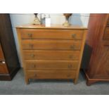 A 1960s mahogany chest of five drawers, strung inlay, square legs, 102cm high x 92cm wide x 51cm