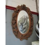 A carved surround mirror, naturalistic theme, a photo frame and an etching of Ely Cathedral from S.