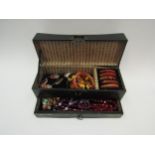 An Oriental style jewellery box with agate beads, amber necklace, amethyst bead necklace etc