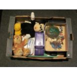 A box of assorted toys including Disney, Cadburys tin, board games etc