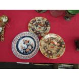 A pair of Royal Crown Derby style Imari plates enriched with gilt, together with a pierced plate (3)